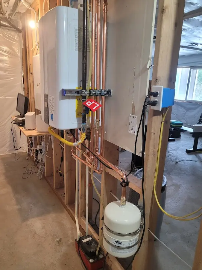 Licensed plumber repairing a kitchen sink in Jasper