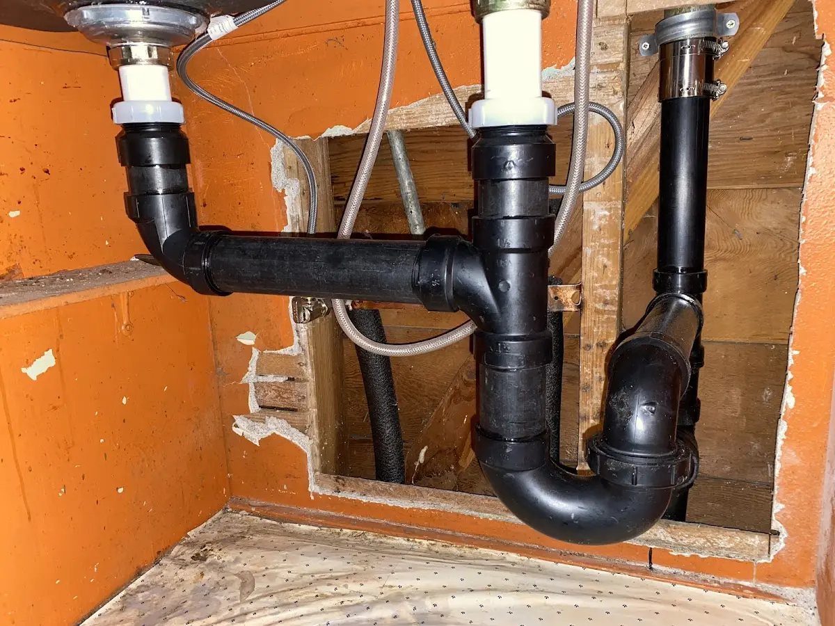 Professional Garbage Disposal Repair equipment and tools on the job in Jasper